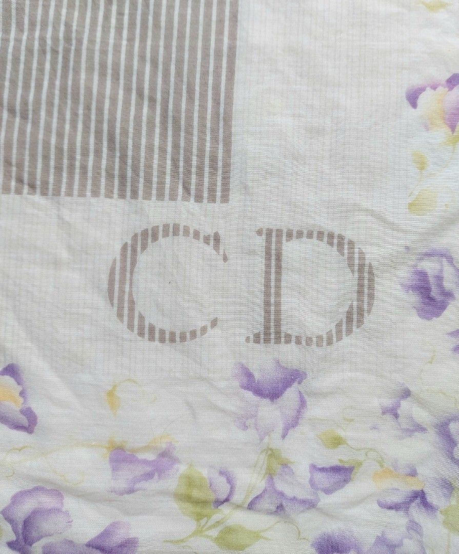 Christian Dior Floral Handkerchief (Category: Handkerchief & Pocket Squares) located in Lapu Lapu. Submitted by agnesapm_29813 (Listing ID 1467505933, Image 3). Description: - Brand: Authentic Christian Dior - Material: Soft, lightweight white cotton - Details: Signature designer logo printed in the bottom corner with a neat hand rolled edges - Measurements: 17 x 17 inches - Usage: Ideal as an everyday accessory or stylish pocket square.