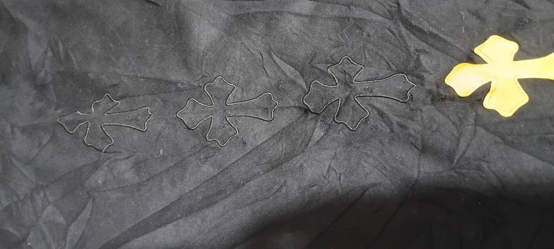 Chrome Hearts Cross Patch Sweatpants Black Yellow (Category: Joggers) located in San Ildefonso. Submitted by rigor32eva20161 (Listing ID 1467389446, Image 3). Description: - Brand: Chrome Hearts - Color: Black with black cross patches and one standout yellow leather cross patch near the cuff - Material: Premium heavy cotton for ultimate comfort and durability - Fit: Relaxed streetwear fit - Details: Adjustable drawstring waist with branded silver