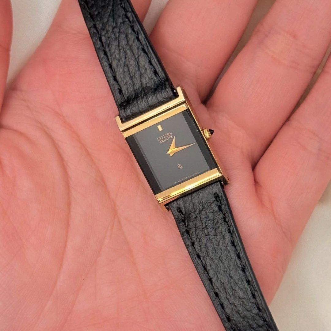 Citizen Mini Tank Black Gold Ladies (Category: Women's Watches) located in Lipa City. Submitted by watchoutph (Listing ID 1467549459, Image 2). Description: Citizen Mini Tank Rare Black gold 1970s Black onyx crown Deep black dial Gold case and accents Quartz 24.8x16.3mm ₱8,500 (reposted with leather black strap).