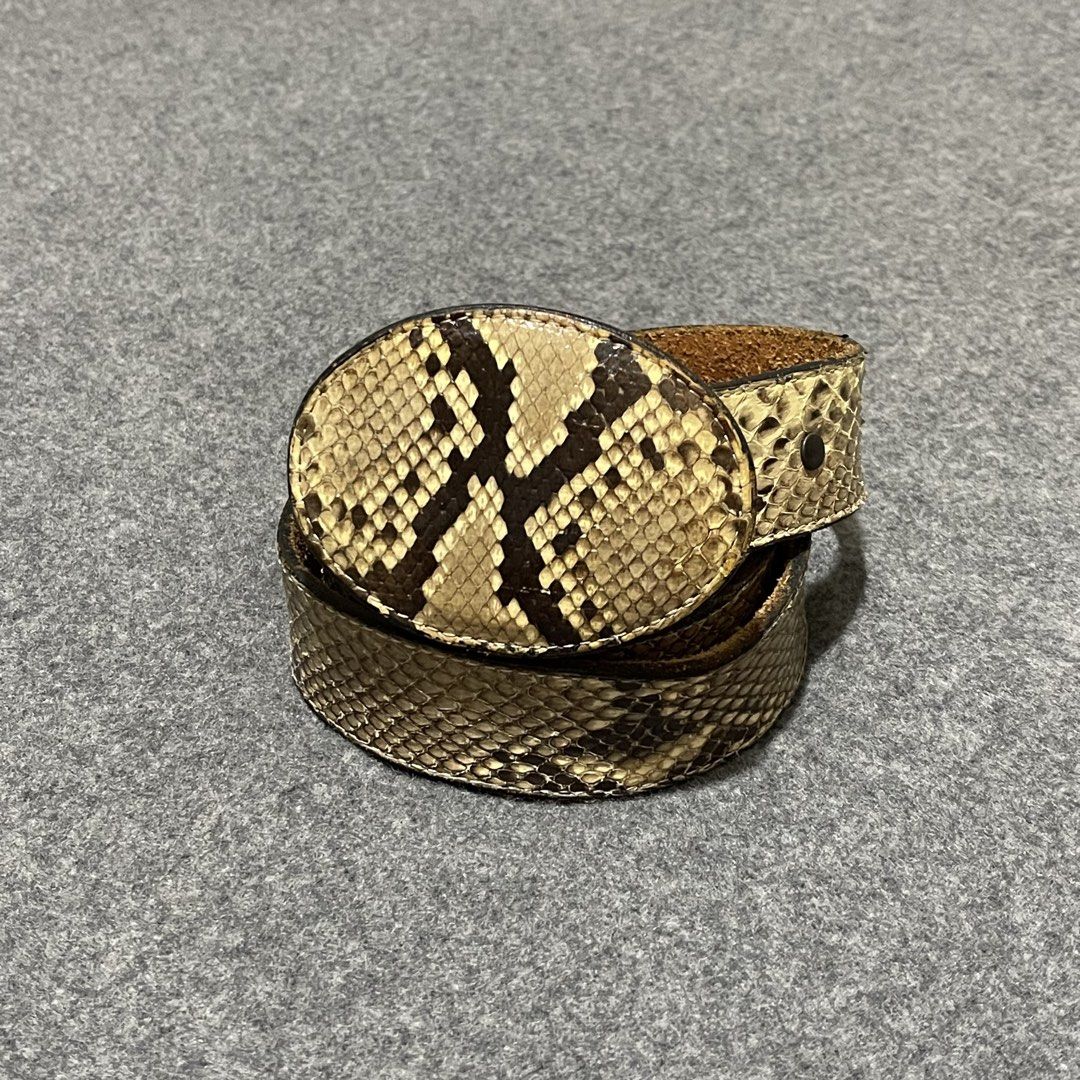 Classic Genuine Python Leather Belt (31-39) (Category: Belts) located in Pasig City. Submitted by _rosasass_ (Listing ID 1467387830, Image 1). Description: Authntic Python Snake skin leather Excellent condition Waistline 31-39 Length 42.5 inch Width 1.5 inch Buckle size 3 inch.