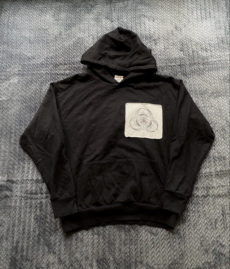 Cloth X Fragment (Category: Coats, Jackets and Outerwear) located in Olongapo. Submitted by WAVYT (Listing ID 1467434355, Image 1). Description: - Color: Black - Size: Medium - Material: 100% cotton (Made in China) - Design: Geometric biohazard graphic on the back and chest patch - Features: Roomy front pocket and comfortable fit - Care: Hand wash recommended.
