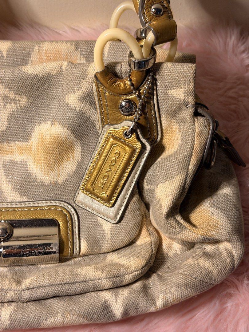 coach bag (Category: Shoulder Bags) located in Daraga. Submitted by littlemissdeclutter.wtme (Listing ID 1467576759, Image 3). Description: Coach Kristin Op Art I-Cat Print satchel handbag. A grey and multi-color signature Op Art pattern on canvas or sateen fabric with leather trim and gold-tone hardware. The bag has double top handles for hand or elbow carry and may include a detachable shoulder strap (not inlcuded). ⁃ kindly manage your expecta