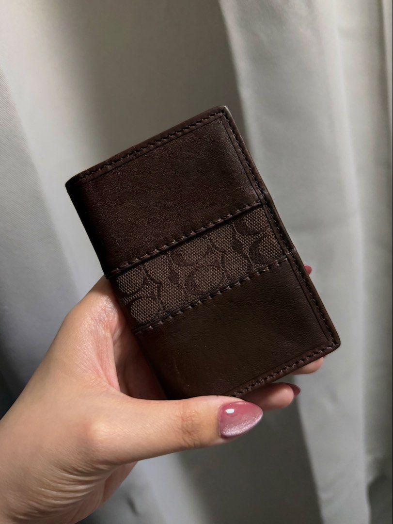 Coach Bifold Card Wallet in Choco Brown (Category: Wallets & Card holders) located in Baguio. Submitted by _herarchives (Listing ID 1467557670, Image 1). Description: This is a vintage Coach piece, so kindly manage your expectations. Please review all photos and details carefully before purchasing. 📌 Prices are FINAL. Lowball offers and haggling will not be entertained..