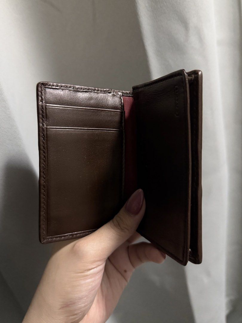 Coach Bifold Card Wallet in Choco Brown (Category: Wallets & Card holders) located in Baguio. Submitted by _herarchives (Listing ID 1467557670, Image 2). Description: This is a vintage Coach piece, so kindly manage your expectations. Please review all photos and details carefully before purchasing. 📌 Prices are FINAL. Lowball offers and haggling will not be entertained..