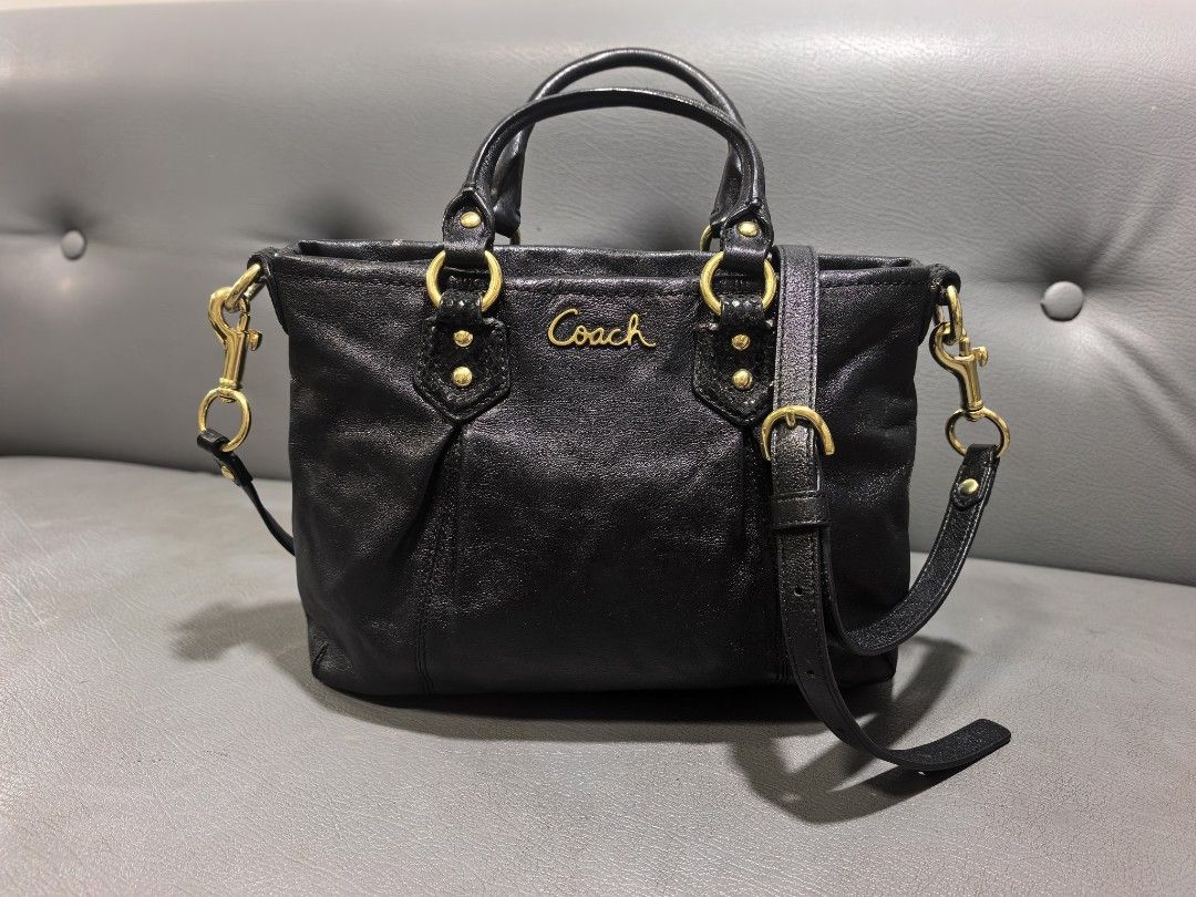 Coach Black Leather Tote Handbag (Category: Luxury Bags & Wallets) located in Cagayan de Oro. Submitted by pootx (Listing ID 1467512051, Image 1). Description: -please check last photos sa issue - Brand: Coach - Color: Classic Black with luxurious gold hardware - Material: Genuine leather - Carry Options: Double top handles and an adjustable/detachable shoulder strap - Closure: Secure zip top closure - Interior: Fabric lining with a zippered pock