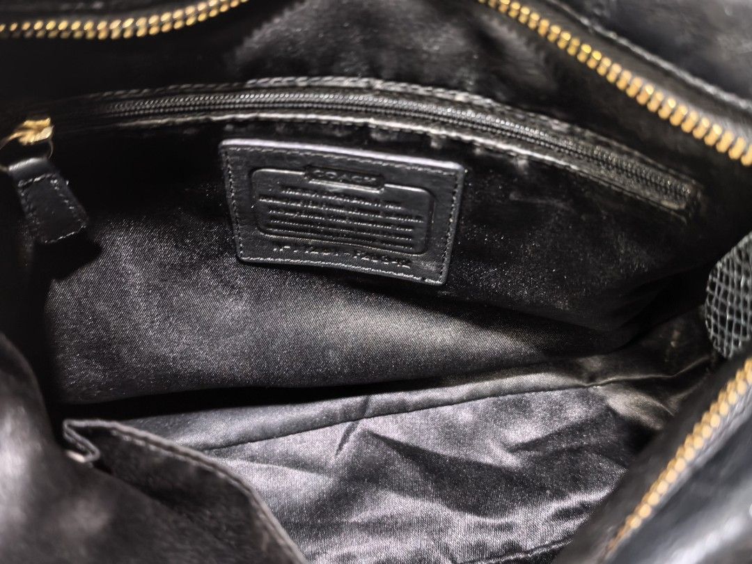 Coach Black Leather Tote Handbag (Category: Luxury Bags & Wallets) located in Cagayan de Oro. Submitted by pootx (Listing ID 1467512051, Image 3). Description: -please check last photos sa issue - Brand: Coach - Color: Classic Black with luxurious gold hardware - Material: Genuine leather - Carry Options: Double top handles and an adjustable/detachable shoulder strap - Closure: Secure zip top closure - Interior: Fabric lining with a zippered pock