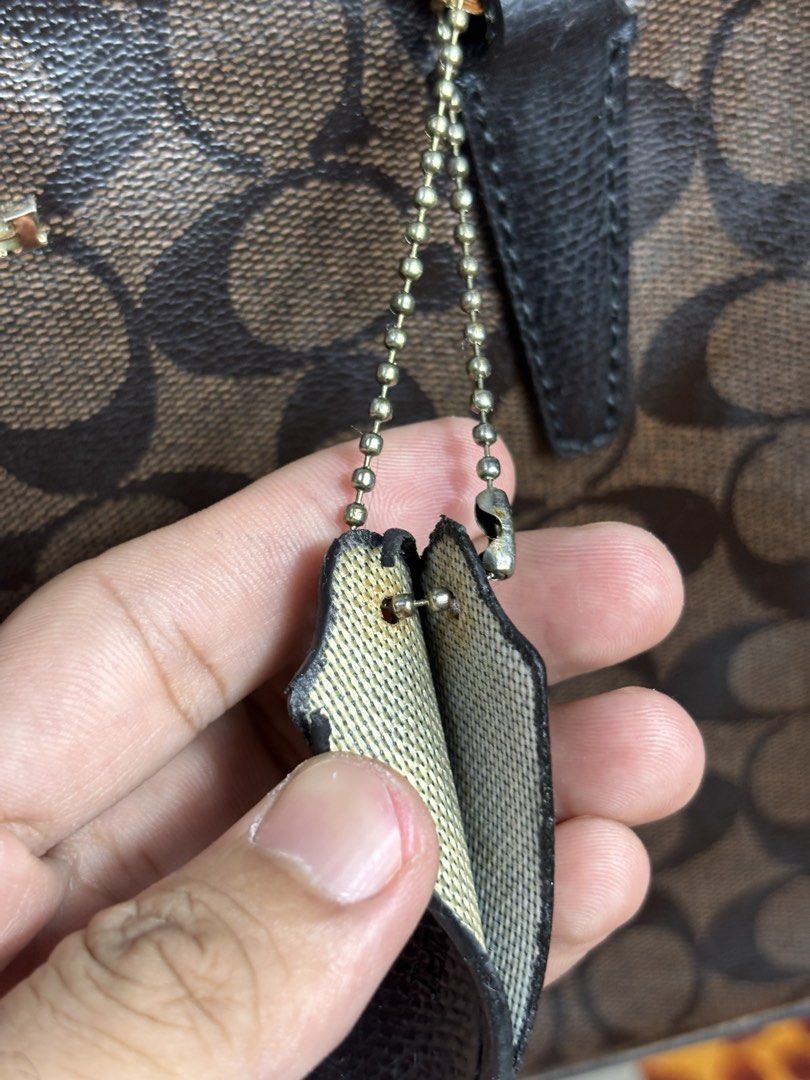 Coach Brown/Black Monogram Canvas Leather Bag (Category: Shoulder Bags) located in Manila. Submitted by earlylifecrisis3 (Listing ID 1467364150, Image 2). Description: Condition 7/10 Measure it by inch Width: 13 Length: 9 Depth: 4 Handle: 8 •Refund / Returns not allowed allowed •Please do check the dimensions size on labels sometimes are not accurate on the sizing •Ask me before purchasing.
