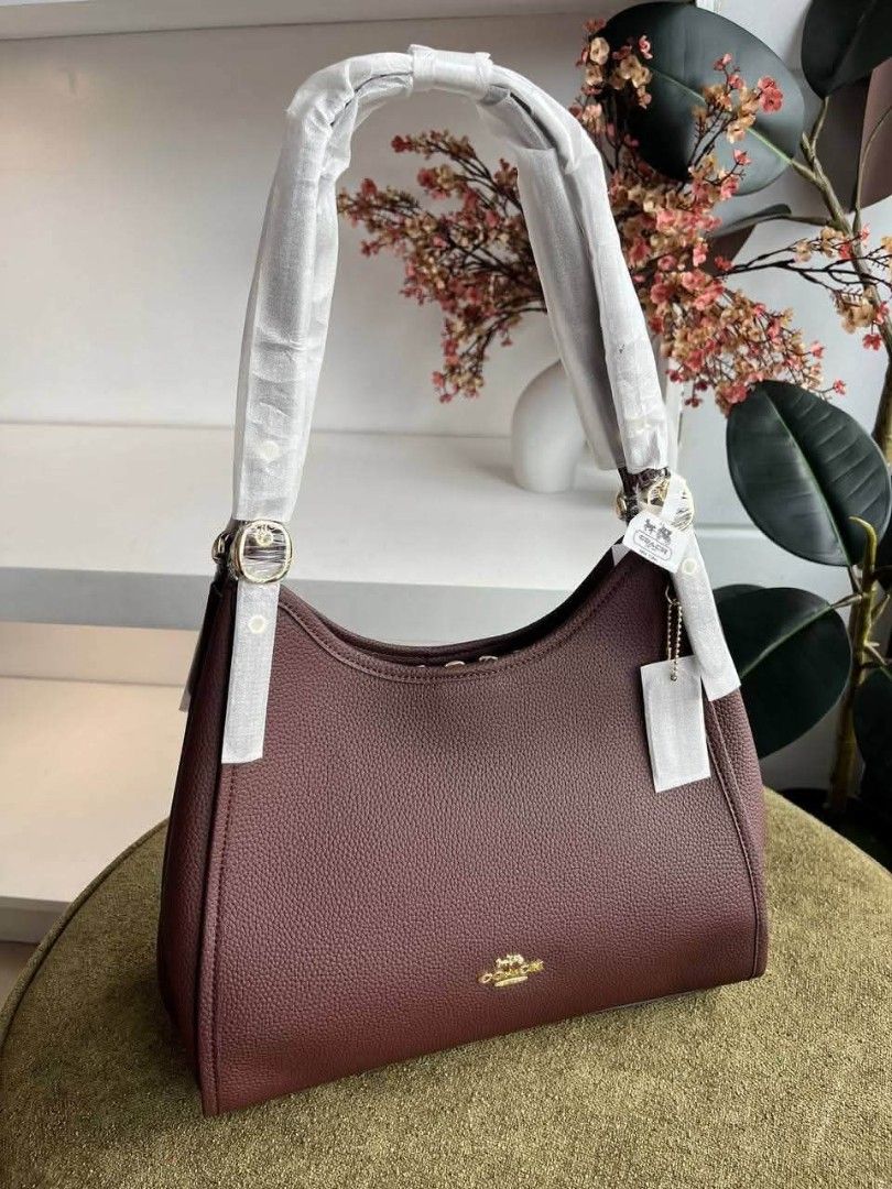 Coach Erin in Maple (Category: Shoulder Bags) located in Quezon City. Submitted by bagsboutiqueph (Listing ID 1467495035, Image 1). Description: LAST PRICE POSTED. LIMITED STOCKS! BRANDNEW WITH INCLUSIONS. COLOR MAY SLIGHTLY VARY IN ACTUAL DUE TO LIGHTING AND CAMERA SETTING. OTHER PHOTOS WILL BE SEND DURING PURCHASE AND FOR SURE BUYERS ONLY. WHEN IN DOUBT, DO NOT ORDER. THANK YOU..