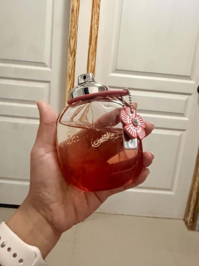 Coach Floral Blush Eau de Parfum 90ml (Category: Fragrance & Deodorants) located in Pinamalayan. Submitted by chay0921 (Listing ID 1467524823, Image 1). Description: - Authentic Coach Floral Blush fragrance - Roughly half full, great way to try the scent - Beautiful pink gradient glass bottle with embossed horse and carriage logo - Includes original leather flower charm and silver hangtag - Spray nozzle fully functioning - Perfect for daily wear 