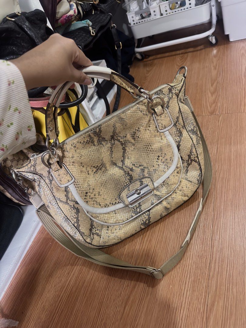 Coach Kristin Snakeskin Python Large Satchel Shoulder Bag Beige Brown Y2K (Category: Shoulder Bags) located in Marikina City. Submitted by poshavenue_boutique (Listing ID 1467576116, Image 2). Description: 👜 Authentic Coach Kristin Snakeskin Print Large Satchel Shoulder Bag Beige Brown Y2K 🏷️ ₱3,200 Condition: Still in Good Preloved Condition Details: • Authentic Coach Kristin (seller-confirmed) • Secondhand / preloved item • Beige and yellow s