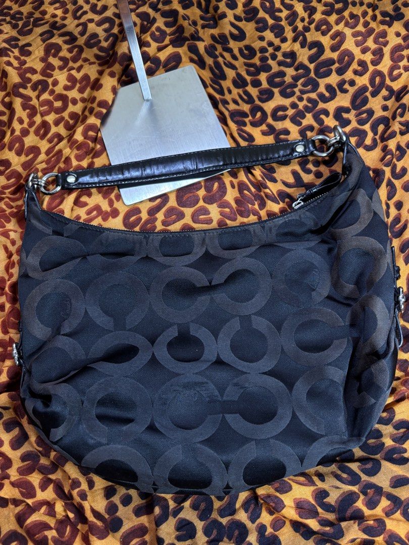 Coach Madison Hobo Bag (Category: Shoulder Bags) located in Manila. Submitted by earlylifecrisis3 (Listing ID 1467369653, Image 2). Description: Condition 8/10 Measure it by inch Width: 15 Length: 9 Depth: 5 Handle: 5.5 •Refund / Returns not allowed allowed •Please do check the dimensions size on labels sometimes are not accurate on the sizing •Ask me before purchasing.