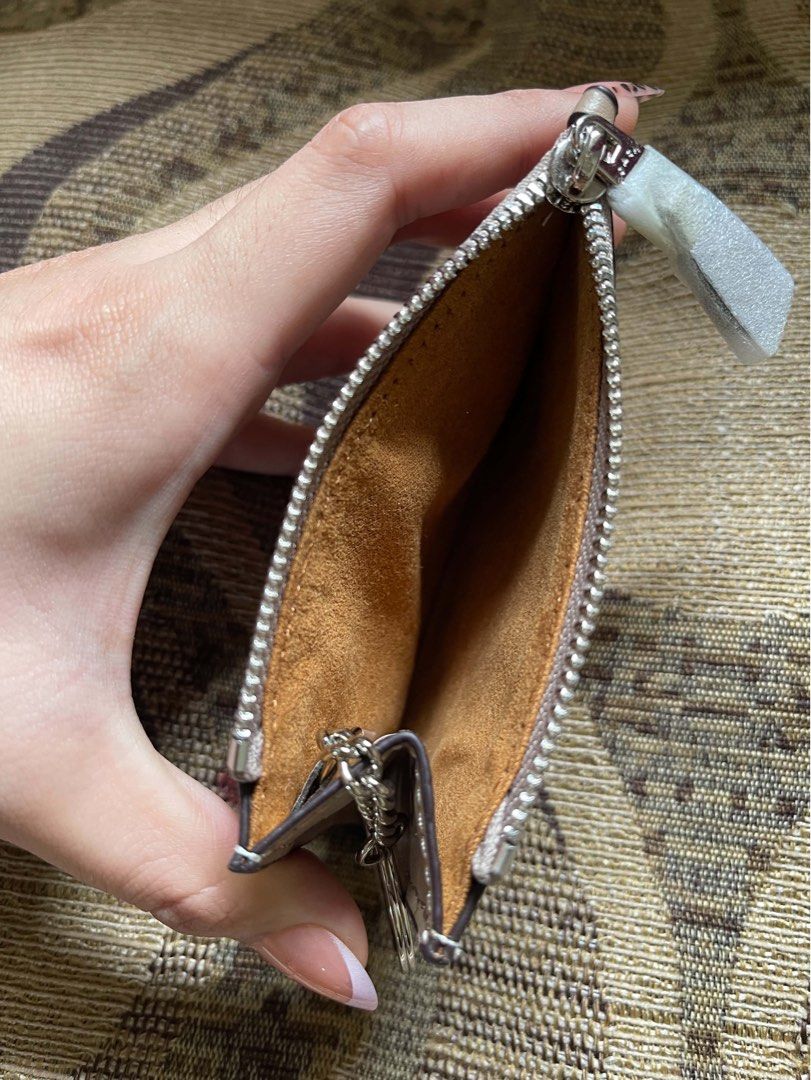 Coach Mini Skinny Id case (Category: Wallets & Card holders) located in Quezon City. Submitted by alexareiz (Listing ID 1467478800, Image 2). Description: BRANDNEW Signature canvass Perfect for everyday use Sand taupe color Silver hardware Made in Vietnam 100% legit .