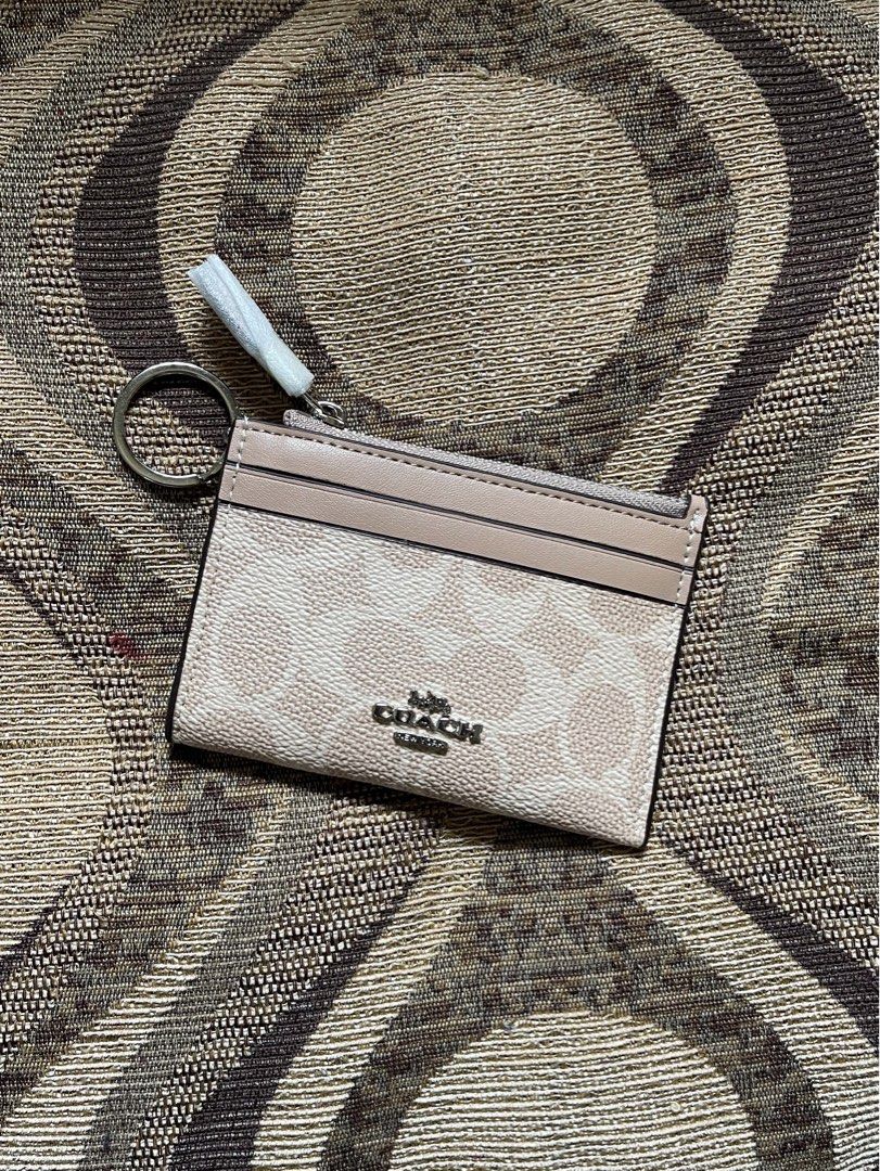 Coach Mini Skinny Id case (Category: Wallets & Card holders) located in Quezon City. Submitted by alexareiz (Listing ID 1467478800, Image 1). Description: BRANDNEW Signature canvass Perfect for everyday use Sand taupe color Silver hardware Made in Vietnam 100% legit .