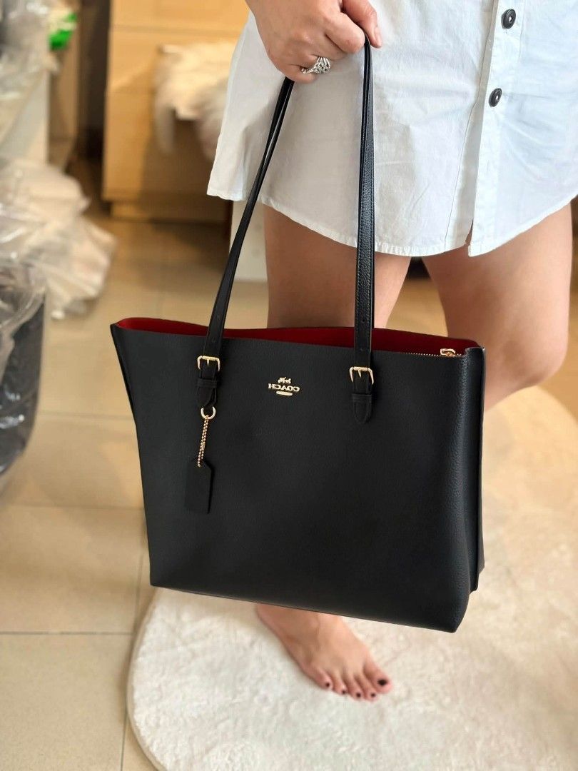 Coach Mollie Tote in Black (Category: Tote Bags) located in Quezon City. Submitted by bagsboutiqueph (Listing ID 1467490856, Image 2). Description: LAST PRICE POSTED. LIMITED STOCKS! BRANDNEW WITH INCLUSIONS. COLOR MAY SLIGHTLY VARY IN ACTUAL DUE TO LIGHTING AND CAMERA SETTING. OTHER PHOTOS WILL BE SEND DURING PURCHASE AND FOR SURE BUYERS ONLY. WHEN IN DOUBT, DO NOT ORDER. THANK YOU..