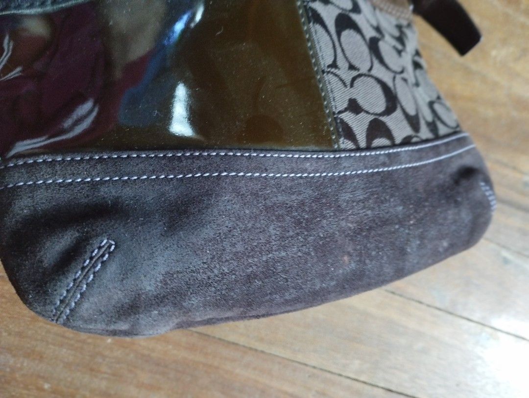 Coach Patchwork Crossbody Bag Signature C Suede Leather (Category: Cross-body Bags) located in Baguio. Submitted by katgon2016 (Listing ID 1467475274, Image 2). Description: - Authentic Coach crossbody bag with a unique patchwork design - Features a stylish mix of brown suede, dark leather, patent olive panel, and signature C canvas fabric - Brass hardware with an adjustable brown strap - Secure top zipper closure - Vibrant purple fabric lining w