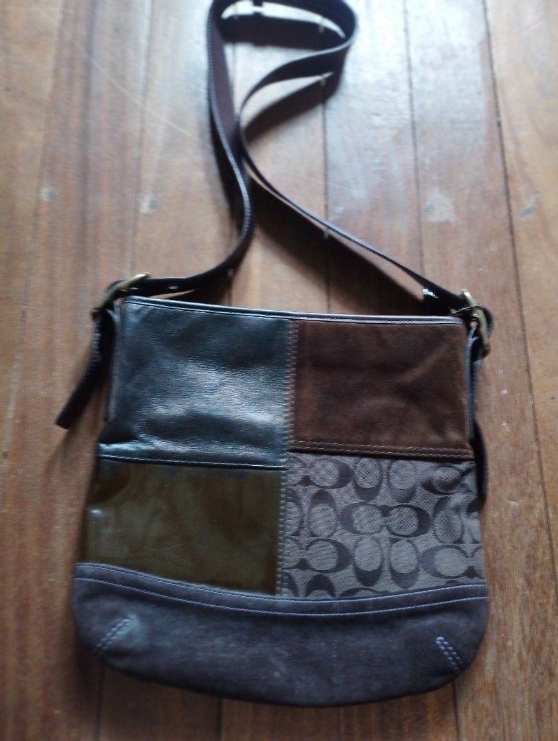 Coach Patchwork Crossbody Bag Signature C Suede Leather (Category: Cross-body Bags) located in Baguio. Submitted by katgon2016 (Listing ID 1467475274, Image 1). Description: - Authentic Coach crossbody bag with a unique patchwork design - Features a stylish mix of brown suede, dark leather, patent olive panel, and signature C canvas fabric - Brass hardware with an adjustable brown strap - Secure top zipper closure - Vibrant purple fabric lining w