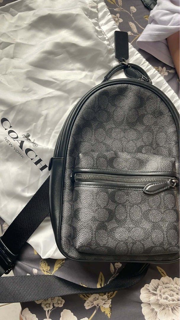 Coach Signature Coated Canvas Black Backpack (Category: Backpacks) located in Manila. Submitted by chizbasbas10272 (Listing ID 1467402123, Image 1). Description: - Authentic Coach black signature canvas backpack - Stylish black leather trim throughout - Front zipped pocket for easy access to essentials - Adjustable straps for a comfortable fit - Includes original Coach dust bag - Condition: Excellent / Well-maintained - Mode of Payment: BPI / GCa