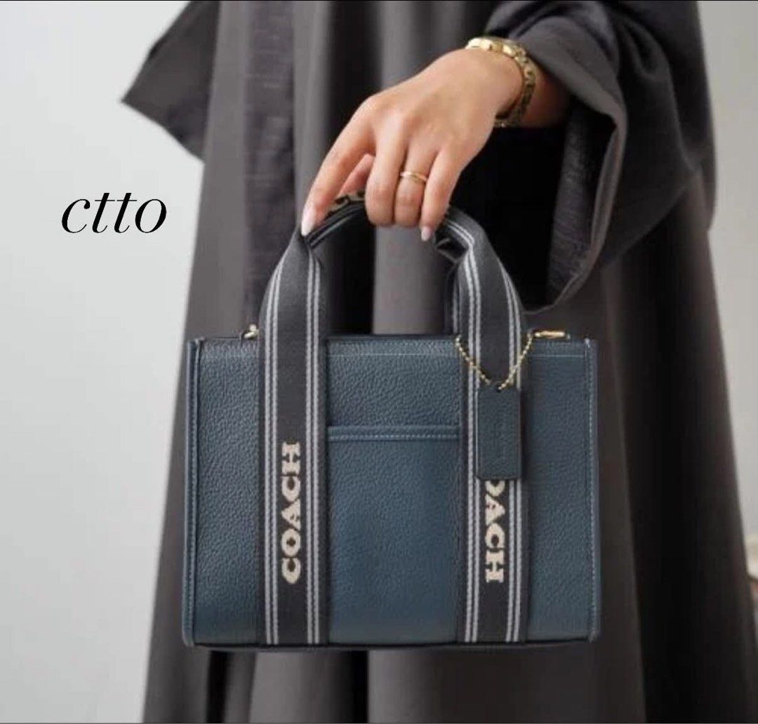 COACH Smith Tote 24 in Denim Multi 🇨🇦 (Category: Cross-body Bags) located in Pasig City. Submitted by kseauthenticfinds (Listing ID 1467449033, Image 1). Description: 𝗡𝗲𝘄 𝗔𝗿𝗿𝗶𝘃𝗮𝗹 ✨ Smith Tote 24 in Denim Multi 🇨🇦 Inclusion/s: tag and care card Pasig/Cainta on hand Product Details Refined pebble leather Handle: 3.75" drop Strap: Detachable 21.75" drop Outside open pocket Inside zip and multifunction pockets 9.5" (L) x 7" (H) x 4.5" (