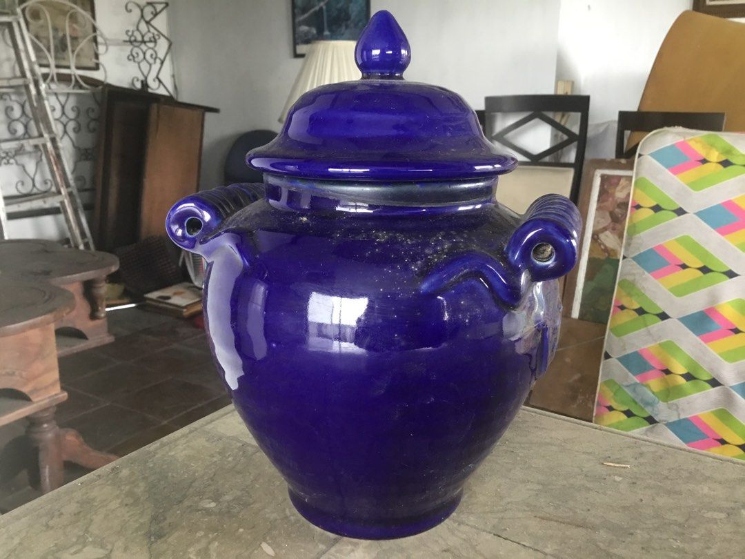 Cobalt Blue Glazed Ceramic Ginger Jar with Lid (Category: Vases & Decorative Bowls) located in Manila. Submitted by roberto.enriquez (Listing ID 1467586812, Image 3). Description: - Color: Deep cobalt blue - Finish: High-gloss glaze all over - Features: Matching lid with pointed finial handle, unique looped scroll handles on both sides - Use: Substantial decorative piece for shelves or tables - Condition: Good, just needs a quick wipe down from d