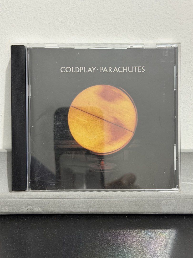 Coldplay - Parachutes (Category: CDs & DVDs) located in Manila. Submitted by triggermancollections (Listing ID 1467370098, Image 1). Description: Triggerman Collections MOP: GCash/Bank Transfer Shipping c/o Buyer Shipping from Marikina City; or Meet-up anywhere in Marikina City Notable Tracks: Yellow, Shiver.