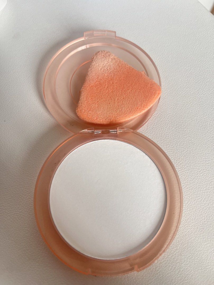 Colourette Pressed Setting Powder (Category: Makeup) located in Santa Rosa. Submitted by prelovedbynin1 (Listing ID 1467392835, Image 3). Description: - Brand: Colourette - Product: Translucent setting powder in a pressed formula - Condition: Barely touched, compact snaps shut securely - Inclusion: Triangular peach puff applicator with ribbon branding - Best for: Baking or setting makeup on the go.