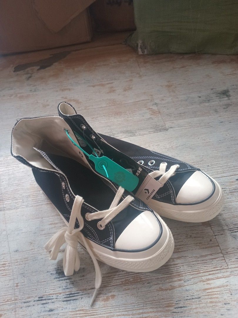 Converse Chuck 70 High Top Black (Category: Sneakers) located in Quezon City. Submitted by jdmagallanes29 (Listing ID 1467409559, Image 2). Description: - Brand: Converse Chuck 70 High-Top - Color: Classic Black with Off-White Laces - Condition: Brand new with original tags and green security tie attachef - Size: US 9.5 Mens / UK 9.5 / EUR 43 / 28 cm - Details: Premium canvas upper, rubber toe cap, and contrast stitching - Origin: Made in Vietnam