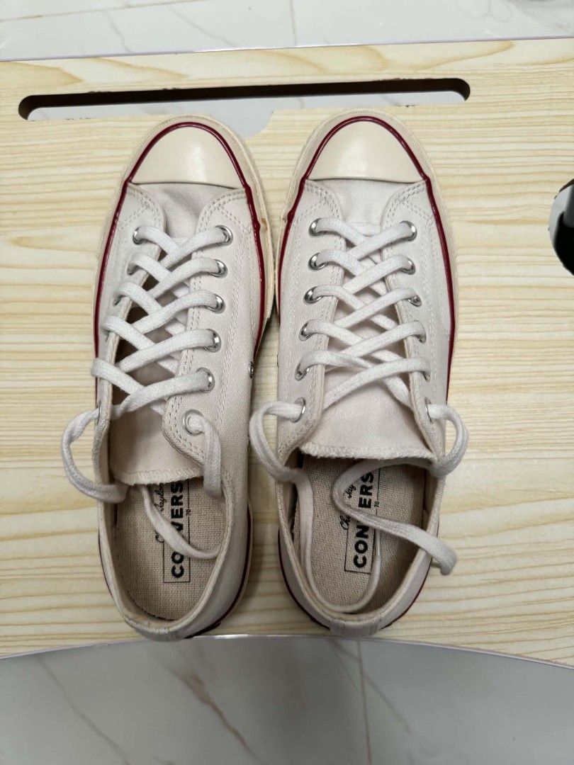 Converse Chuck 70 Low Top Parchment US7 Mens (Category: Sneakers) located in Quezon City. Submitted by screenball25 (Listing ID 1467405838, Image 2). Description: - Model: Converse Chuck 70 Low Top - Colorway: Parchment - Classic canvas upper with vintage glossy midsole - Iconic contrast black pinstripe and metal eyelets - Durable rubber toe cap and standard lacing - Clean insoles with original Converse branding intact - Versatile, timeless every