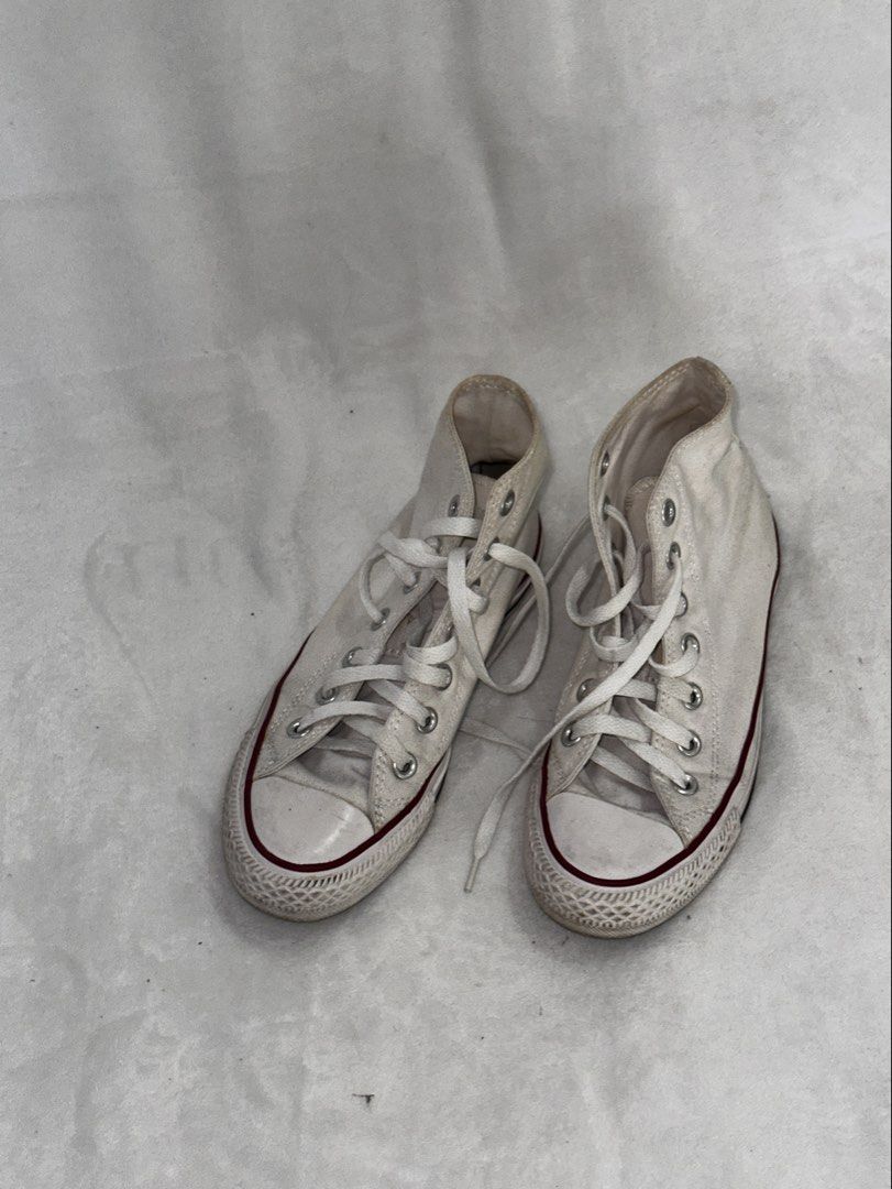 Converse Chuck Taylor All Star High Top White (Category: Sneakers) located in Malolos. Submitted by josaruby (Listing ID 1467403444, Image 1). Description: - Item: Classic Converse Chuck Taylor All Star High Tops - Color: White - Size: Men's 3.5 / Women's 5.5 / UK 3.5 / EUR 36 / 22.5 cm - Material: Canvas upper, rubber toe cap and outsole - Details: Lace-up with metal eyelets, iconic inner ankle star patch, made in Vietnam - Condition: Shows some