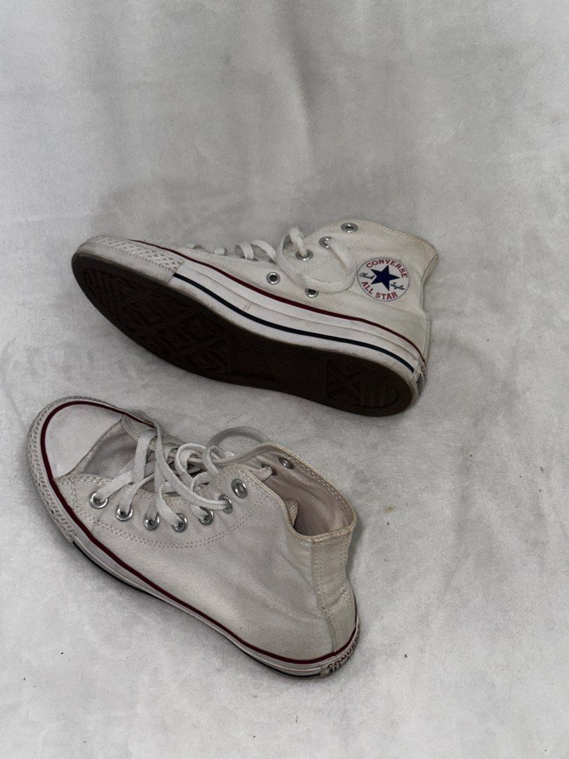 Converse Chuck Taylor All Star High Top White (Category: Sneakers) located in Malolos. Submitted by josaruby (Listing ID 1467403444, Image 3). Description: - Item: Classic Converse Chuck Taylor All Star High Tops - Color: White - Size: Men's 3.5 / Women's 5.5 / UK 3.5 / EUR 36 / 22.5 cm - Material: Canvas upper, rubber toe cap and outsole - Details: Lace-up with metal eyelets, iconic inner ankle star patch, made in Vietnam - Condition: Shows some