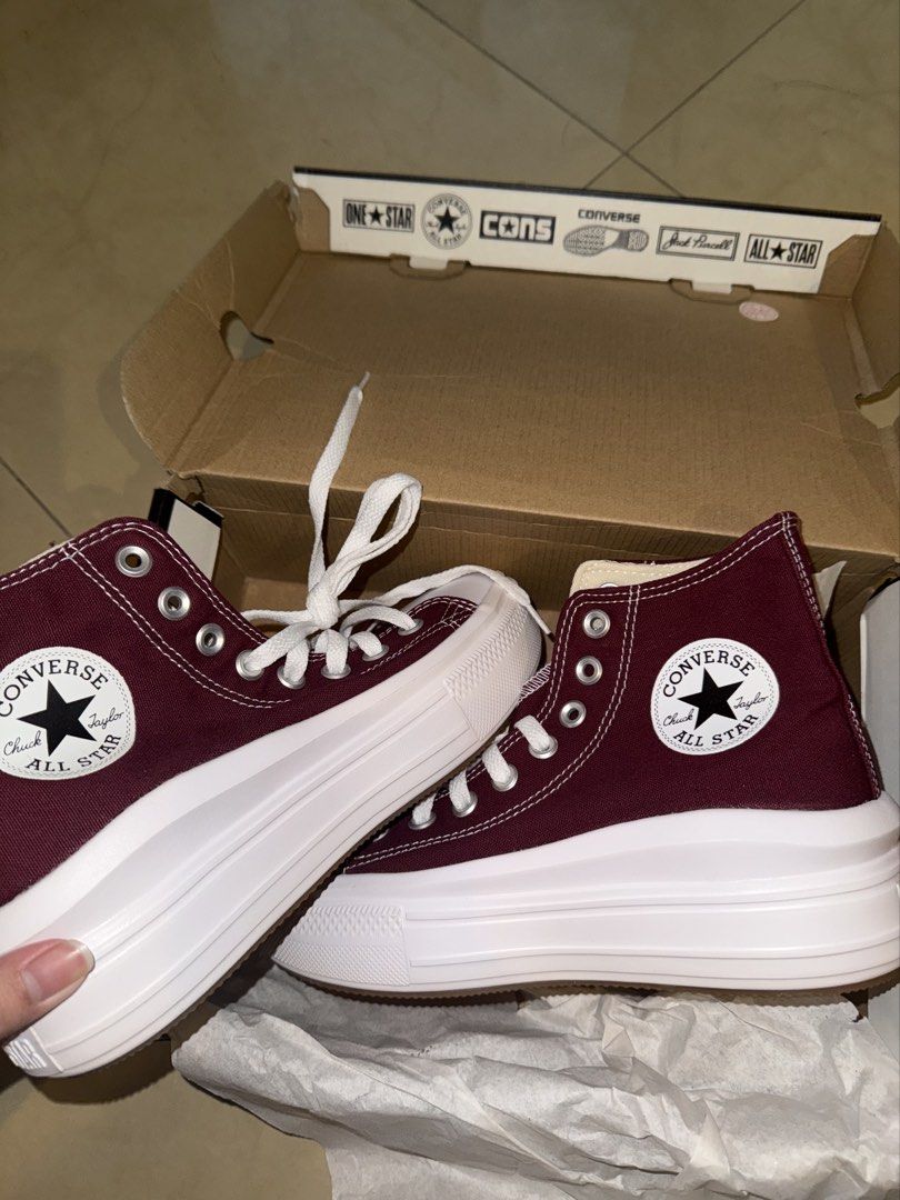 Converse Chuck Taylor All Star Move Hi (Category: Sneakers) located in Marikina City. Submitted by gbbyxrlls (Listing ID 1467560965, Image 1). Description: - Brand: Converse - Style: High Top Platform Sneakers - Color: Burgundy/Dark Beetroot with white laces and midsole - Sole: Thick white platform with gum rubber outsole - Size: US Women's 7 / UK 5 / EUR 37.5 / 24cm - Condition: Brand new, zero wear in, completely clean - Inclusions: Original bo