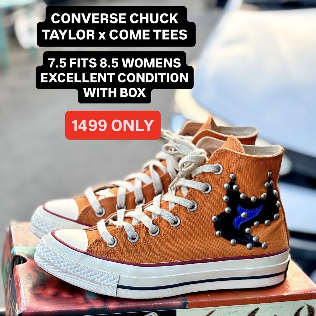 Converse Chuck Taylor x Come Tees High Top (Category: Sneakers) located in San Fernando. Submitted by kickslocker (Listing ID 1467378044, Image 1). Description: - Eye-catching orange canvas high tops with edgy black leather cutouts and metallic studs - Unique 'Come Tees' and 'Star Path' prints along the heels - Bold custom patterned black and white outsoles - Size: Men 5.5 / Women 7.5 (comfortably fits up to a Women 8.5) - Perfect for streetwear 