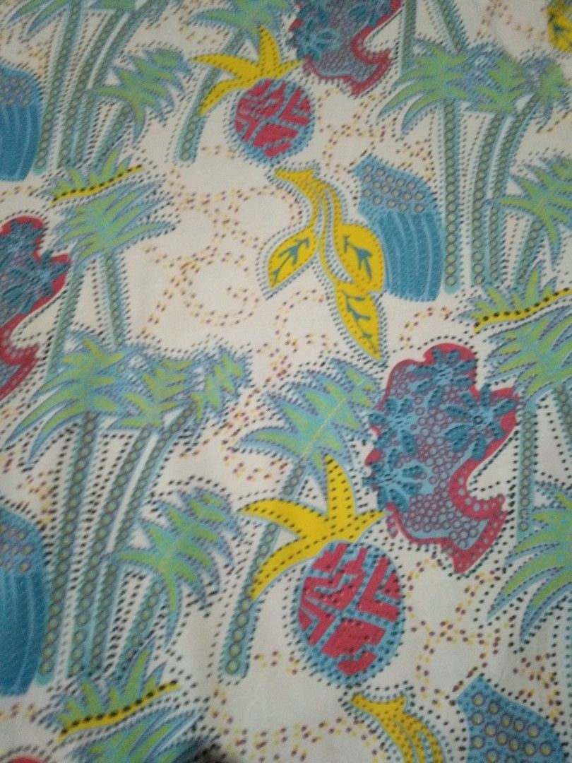 Coogi Tropical Print T-Shirt Medium (Category: Tshirts & Polo Shirts ) located in Camalaniugan. Submitted by mateojuliu73958 (Listing ID 1467402007, Image 3). Description: - Brand: Coogi - Size: Medium: 21.5/29 - Design: All-over tropical pattern (palm trees, pineapples, abstract shapes) - Colorway: Blue, pink, yellow, and green on a white base - Details: Crew neck, short sleeves - Material: 100% cotton - Origin: Made in China - Care Instructions
