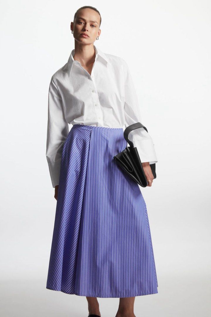 COS stripe midi skirt (Category: Skirts) located in San Pablo. Submitted by iamtrina (Listing ID 1467534082, Image 1). Description: A line style Fits 27-28” waist 32” length 100% cotton With size zip .