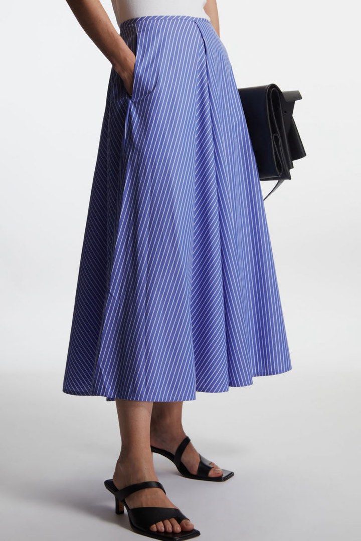 COS stripe midi skirt (Category: Skirts) located in San Pablo. Submitted by iamtrina (Listing ID 1467534082, Image 2). Description: A line style Fits 27-28” waist 32” length 100% cotton With size zip .