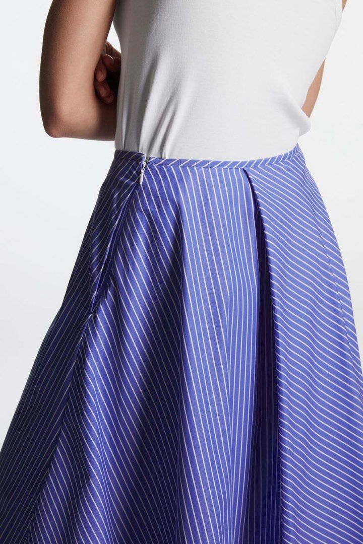 COS stripe midi skirt (Category: Skirts) located in San Pablo. Submitted by iamtrina (Listing ID 1467534082, Image 3). Description: A line style Fits 27-28” waist 32” length 100% cotton With size zip .