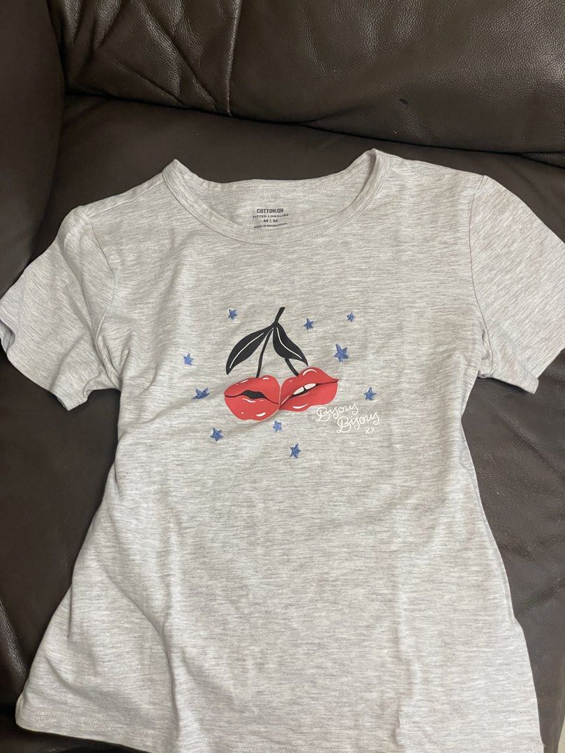 Cotton On Baby Tee Cherry Lips (Category: Shirts) located in Manila. Submitted by amberwinslow (Listing ID 1467440527, Image 1). Description: Cotton On Gray Baby Tee Cherry Lips in size M. Fits S-M. Bought at SM Lanang. Lightly used. Bought for 699 Cotton On Baby Tee Fits size S-M.