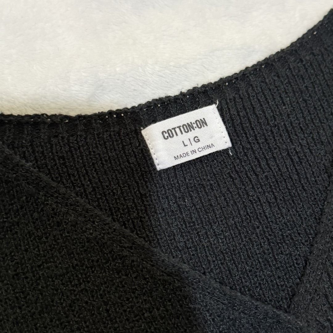 Cotton On Black Rib Knit Button Vest (Category: Sleeveless) located in Dasmarinas. Submitted by kiyanah (Listing ID 1467559794, Image 3). Description: - black rib knit button vest - best fits medium-large frame - armhole is a bit big, I’d recommend wearing a camisole or tube top underneath RFS: not my style anymore; decluttering Measurement: Length - 19 inches Width - 17.5 inches.