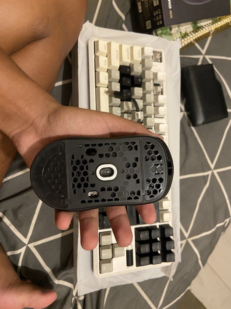 Cougar Revenger Pro 4K Wireless Gaming Mouse and Keyboard (Category: Computer Keyboard) located in Manila. Submitted by pinkwarded (Listing ID 1467550820, Image 3). Description: - Model: Cougar Revenger Pro 4K Wireless Gaming Mouse - Color: Black and White with honeycomb shell design - Included: Extra back cover, mechanical keyboard, detachable braided USB-C cable, and wireless receiver adapter block - Packaging: Original box included - Condition