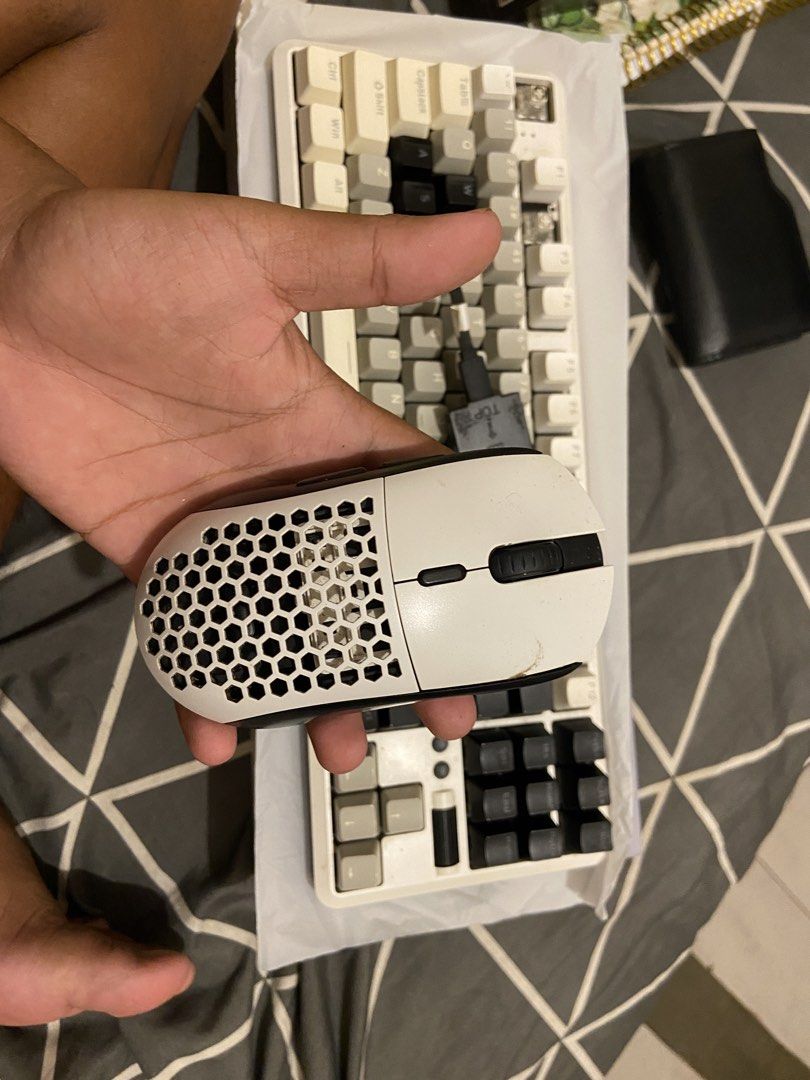Cougar Revenger Pro 4K Wireless Gaming Mouse and Keyboard (Category: Computer Keyboard) located in Manila. Submitted by pinkwarded (Listing ID 1467550820, Image 2). Description: - Model: Cougar Revenger Pro 4K Wireless Gaming Mouse - Color: Black and White with honeycomb shell design - Included: Extra back cover, mechanical keyboard, detachable braided USB-C cable, and wireless receiver adapter block - Packaging: Original box included - Condition