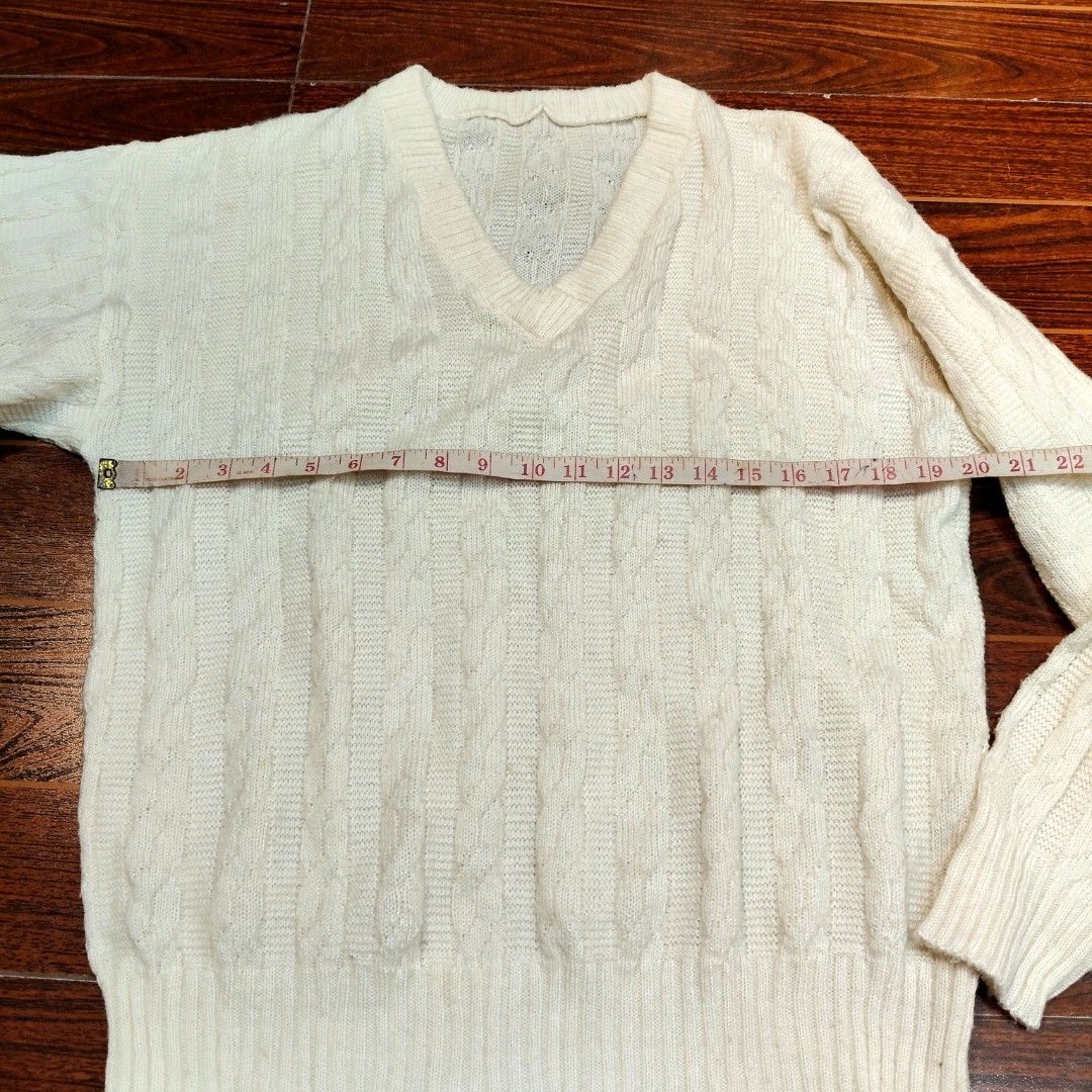 Off White V-Neck Cable Knit Pullover Sweater Likenew (Category: Coats, Jackets and Outerwear) located in Bulacan. Submitted by alyssarys (Listing ID 1467503635, Image 3). Description: Cream white cable knit sweater with a V-neckline. -stretch premium imported fabric. Laid-flat measurements: length 25 inches, width 20 inches, armhole 10 inches. Fits size L to XL. Clean fabric with zero flaws..