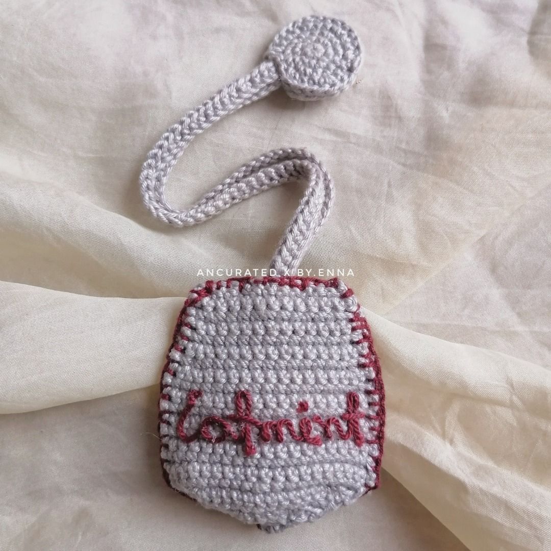 Crochet Catmint pocket watch (Category: Men's Watches) located in Escalante. Submitted by byenna (Listing ID 1467303623, Image 2). Description: This is an original watch from Catmint. since the original faux leather was completely peeling off, so I stripped it down and remade the casing entirely. Hand-crocheted the pouch, embroidered the little details, and added a fresh battery so it’s ticking perfectly again. It's a one-of-a-kind artisan piece 