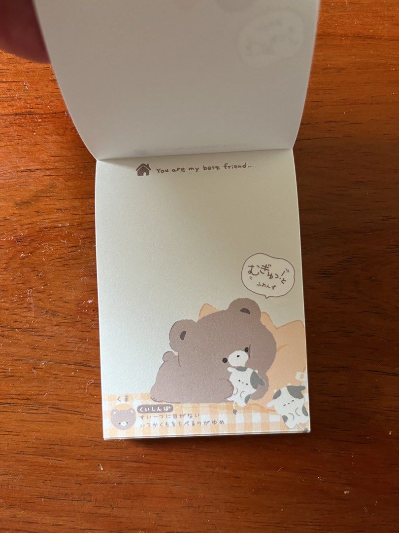 Cute Bear and Cow Memo Pad Sticky Note Paper (Category: Stationery & School Supplies) located in Malolos. Submitted by mavi.annxo (Listing ID 1467387821, Image 2). Description: - Adorable brown bear and cow illustrations with a yellow gingham check border - Features a shiny holographic glitter foil finish on the top header - Text reads: "You are my best friend..." - Easy tear-off pages for convenience - Perfect for journaling, scrapbooking, and d