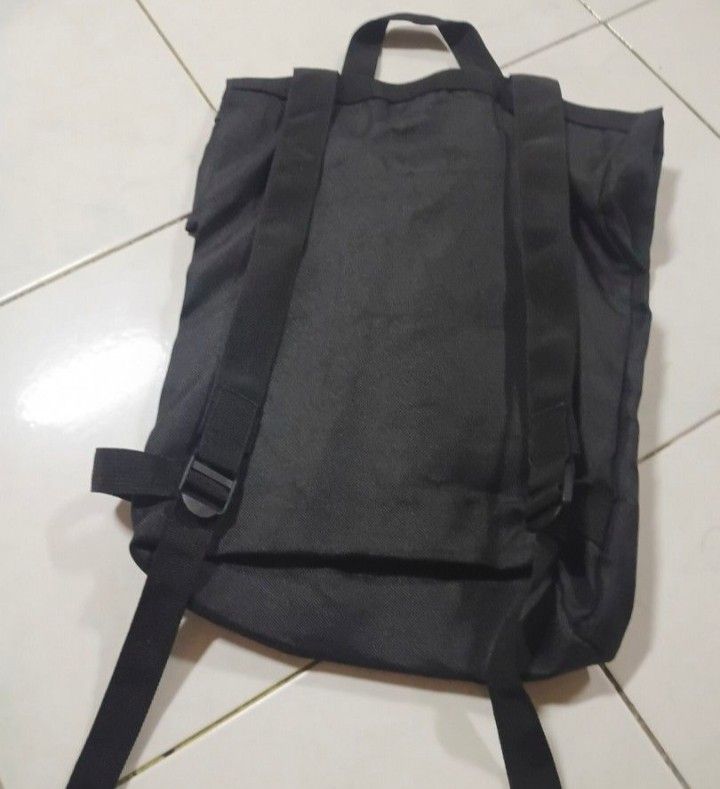 DAISO Black Square Backpack (Category: Backpacks) located in Quezon City. Submitted by xorei (Listing ID 1467504007, Image 3). Description: The Daiso Black Square Backpack is a minimalist, casual daypack designed for utility and everyday commuting. It features a functional, structured. design built for light travel or school use..