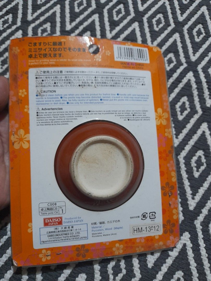 Daiso Japan Mini Mortar and Pestle 10cm (Category: Coffee & Tea Tableware) located in Bocaue. Submitted by marajapansurplus (Listing ID 1467483979, Image 3). Description: - Authentic Daiso Japan Japanese-style mini mortar and pestle set - Like.new, sealed in original plastic wrap with backing card - 10cm diameter compact size, perfect for tabletops - Ceramic mortar bowl designed with a ribbed interior for efficient grinding - Includes a matching 