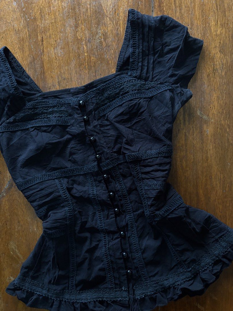 Dark Coquette Milkmaid Buttondown Top (Category: Blouses) located in Manila. Submitted by da.rrel.real (Listing ID 1467458801, Image 2). Description: ⋆˚꩜｡ details ⋆˚꩜｡ size : small-medium issues : none color rate : 9/10 .✦ ݁˖ rules .✦ ݁˖ * no return / refund / exchange * you ask for more photos if you're SURE BUYER * shipping fee is shouldered by buyers unless stated otherwise (loc: Baguio City) love, darrel 𝜗𝜚⋆₊˚ .