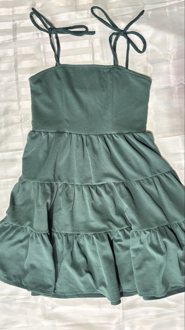 Dark green tiered spaghetti strap dress (Category: Dresses) located in Manila. Submitted by meowraze (Listing ID 1467371922, Image 1). Description: Color: Dark green.