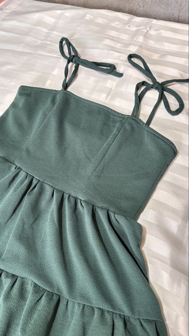 Dark green tiered spaghetti strap dress (Category: Dresses) located in Manila. Submitted by meowraze (Listing ID 1467371922, Image 2). Description: Color: Dark green.