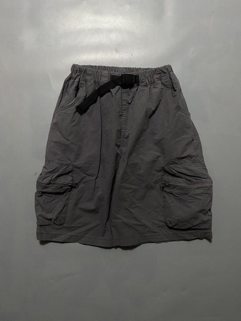 Dark Grey Cargo Shorts with Built-In Belt (Category: Shorts) located in Manila. Submitted by delunakenn94368 (Listing ID 1467509579, Image 1). Description: - Color: Dark grey - Material: Durable nylon - Fit: Relaxed fit, hits right at the knee - Waistband: Elastic waist with an adjustable black web belt and plastic buckle - Storage: Large zippered pockets on both sides - Versatility: Ideal for hiking, outdoor activities, street style, and everyda