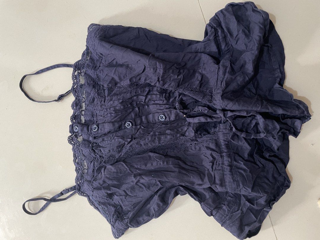 Dark Navy Blue Lace Cami Top with Buttons (Category: Sleeveless) located in Dinalupihan. Submitted by maple.apparel (Listing ID 1467437071, Image 1). Description: Color: Dark navy blue - Material: Lightweight, breathable cotton - Design: Adjustable spaghetti straps, delicate lace trim, functional front buttons with pleating details - Condition: Brand new/preloved with slight storage wrinkles (will easily smooth out after a wash) - Style tip: Perf