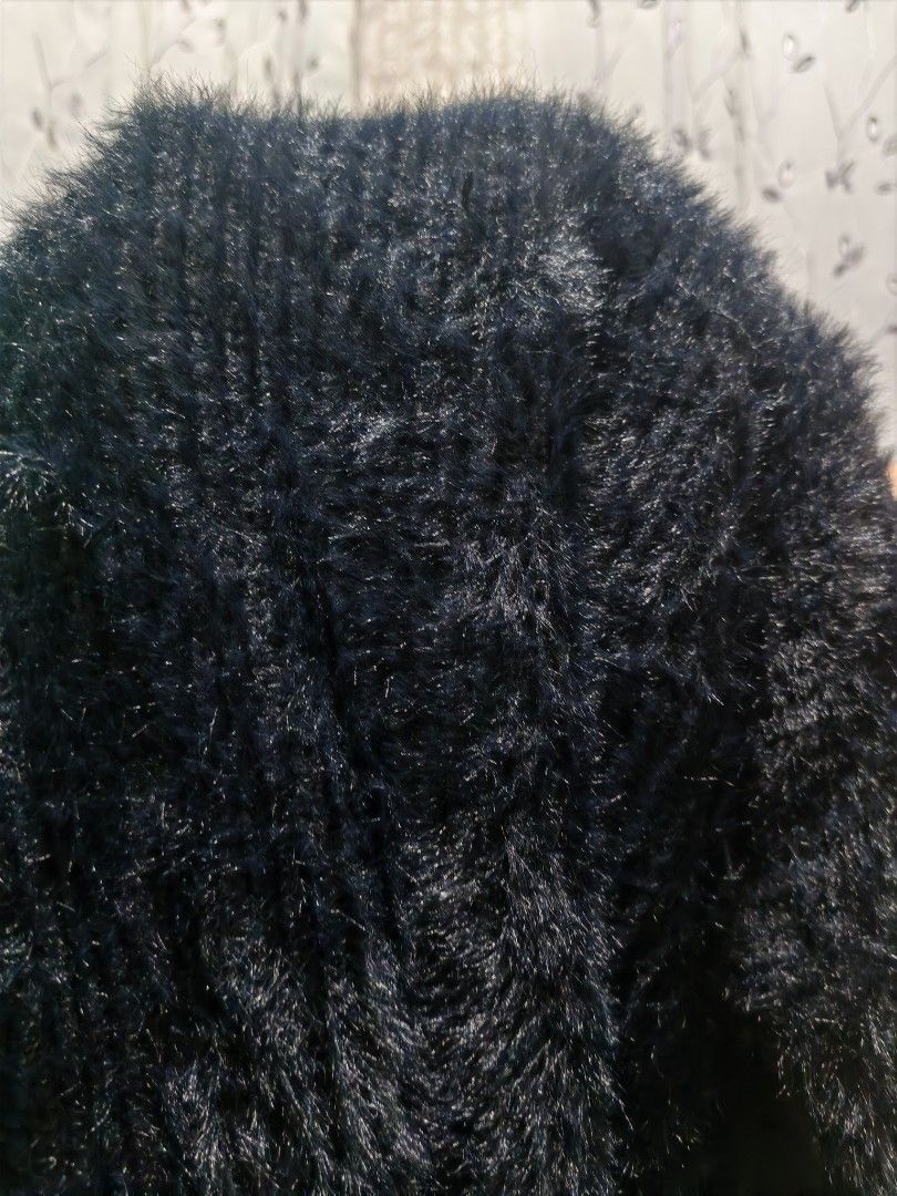 Day & Night Black Fluffy Knit Sweater Size S (Category: Longsleeves) located in Caloocan City. Submitted by _misskaye (Listing ID 1467474316, Image 3). Description: - Brand: Day & Night - Size: Small - Color: Black - Material: Soft fuzzy knit texture - Design: Crew neck, long sleeves, and front tie knot at the hem - Condition: Great, clean with no flaws.